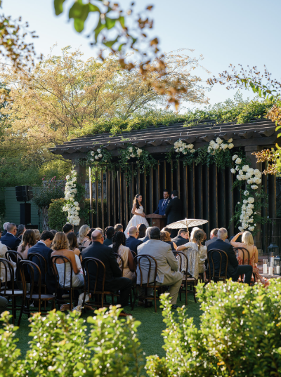 A wedding ceremony taking place outdoors during a luxury wedding weekend
