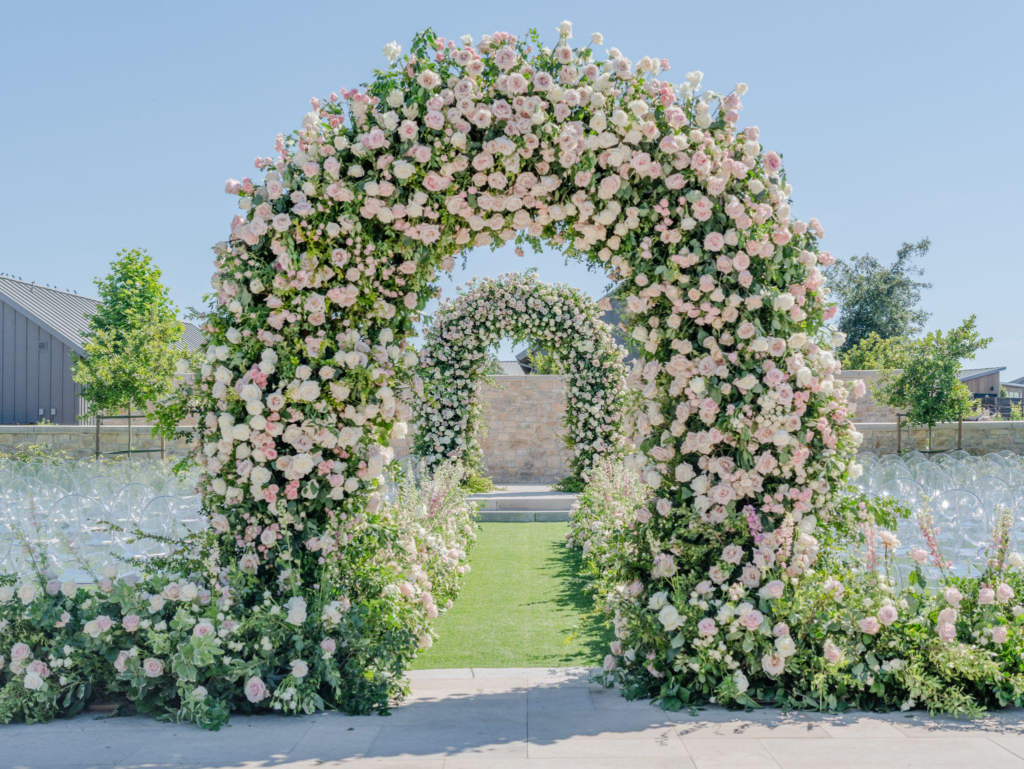 A flower arch on the aisle