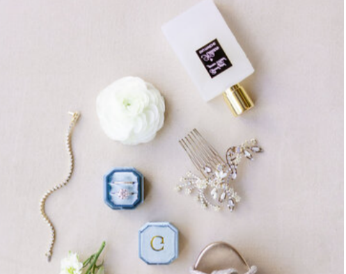 Elegant bridal accessories, including a bracelet, a delicate hairpiece, and more