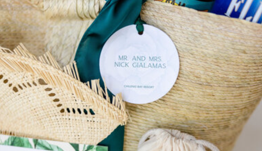 A stylish jute wedding welcome bag filled with locally inspired goodies and essentials for guests
