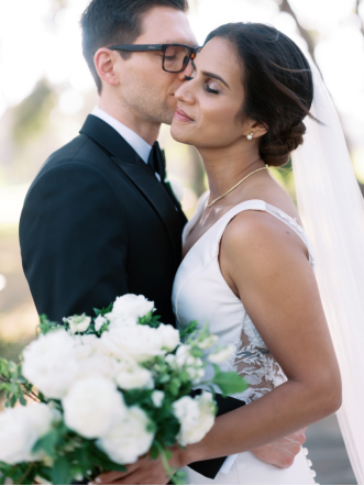 a bride and groom at a wedding reception.