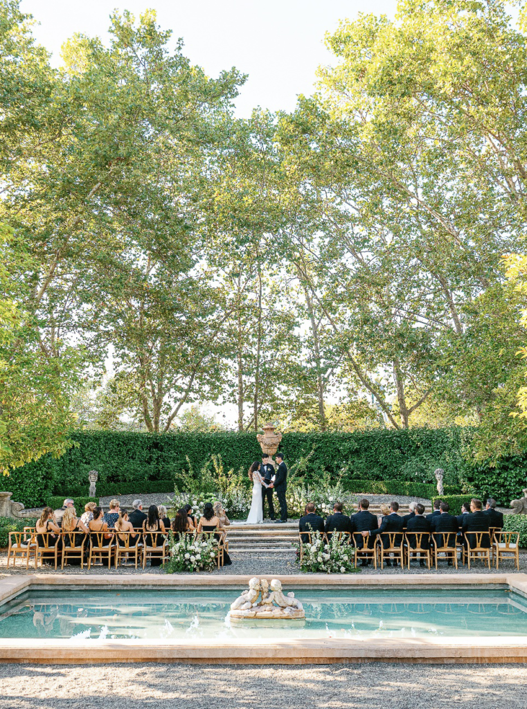 An image of a bride and groom during ceremony