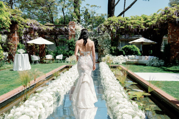 a bride in a white gown in a private LA estate.