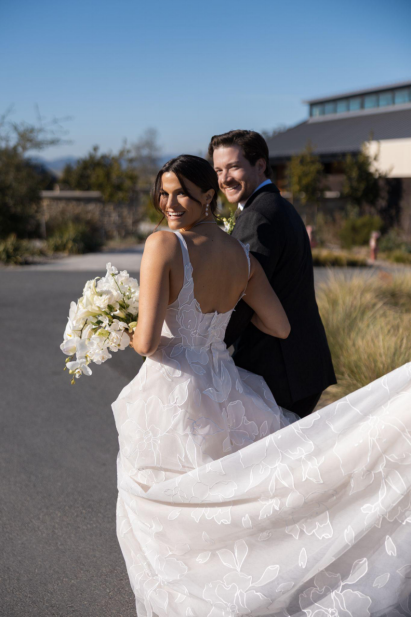 a bride holding a bouquet