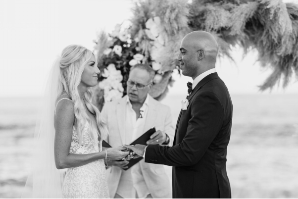 couple exchanging vows.