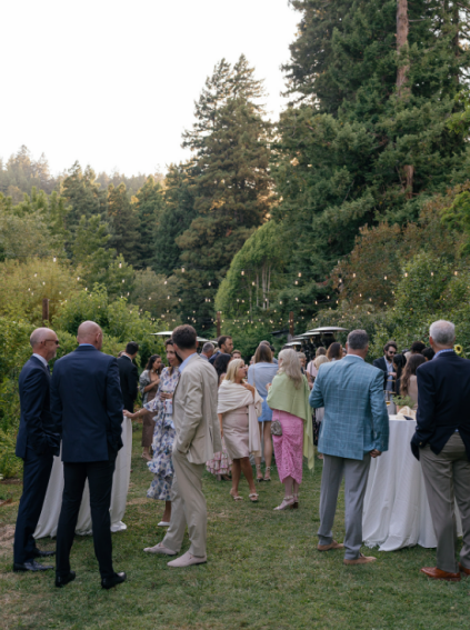 An image of wedding guests during a rehearsal dinner