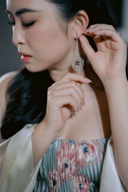 a bride wearing earrings.