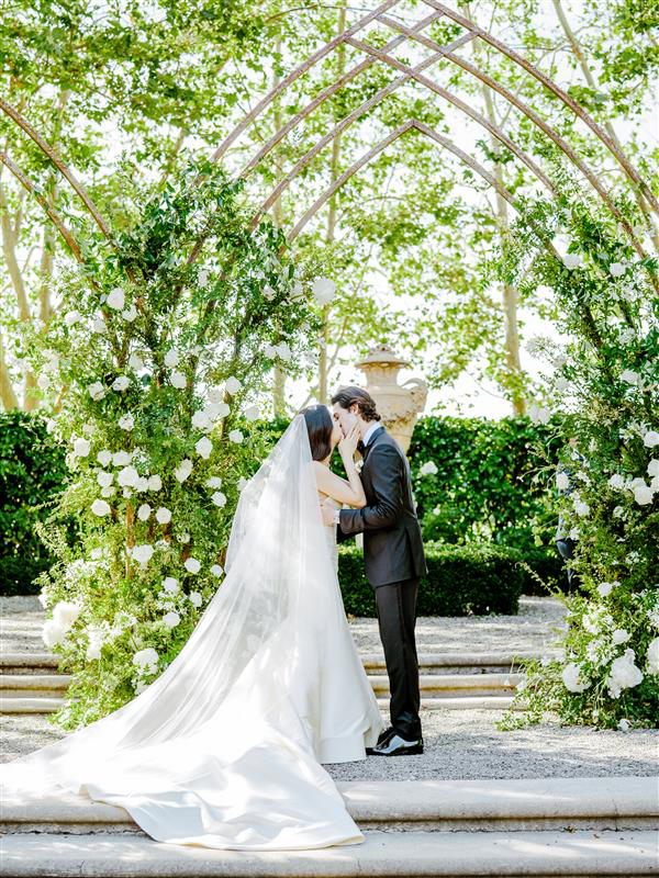 a bride and groom on their wedding day.
