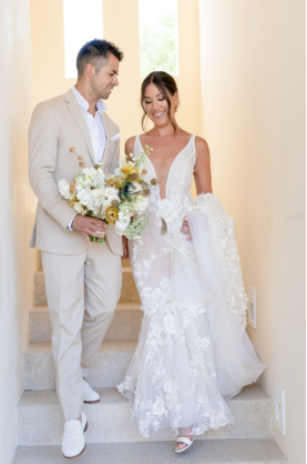 Couple walking together after their Caribbean wedding ceremony
