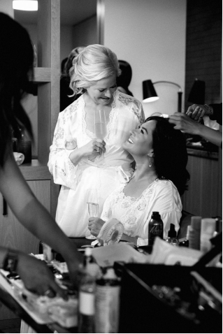 brides smiling at each other