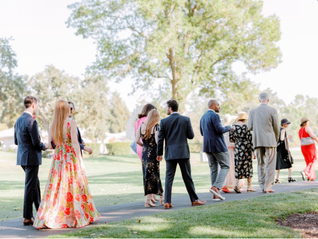 wedding-guests-walking-outdoors-ceremony