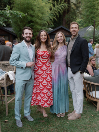 wedding guests posing for a photo together