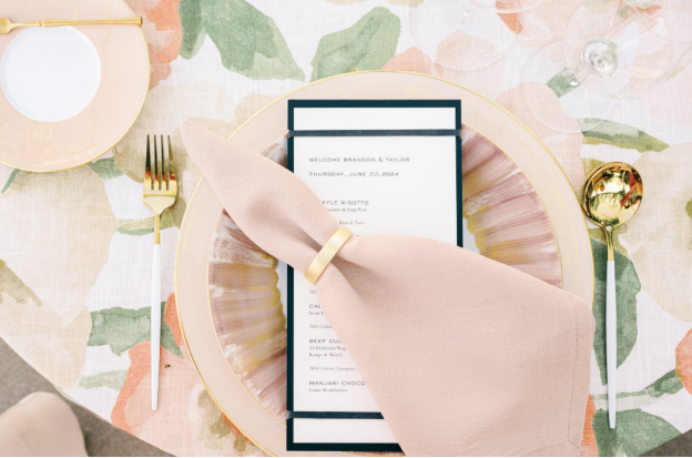Elegant table setting with menu card and gold flatware at a Chicago wedding