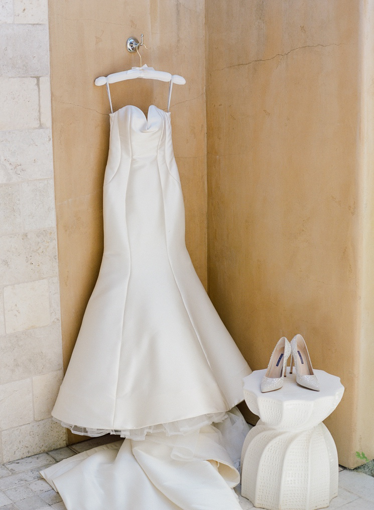 a beautiful dress and a pair of heels.