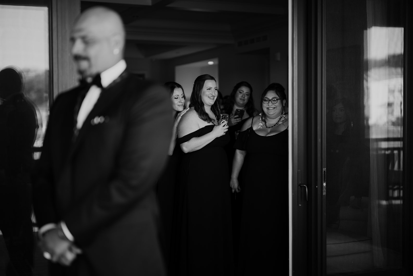 A black-and-white picture of wedding guests