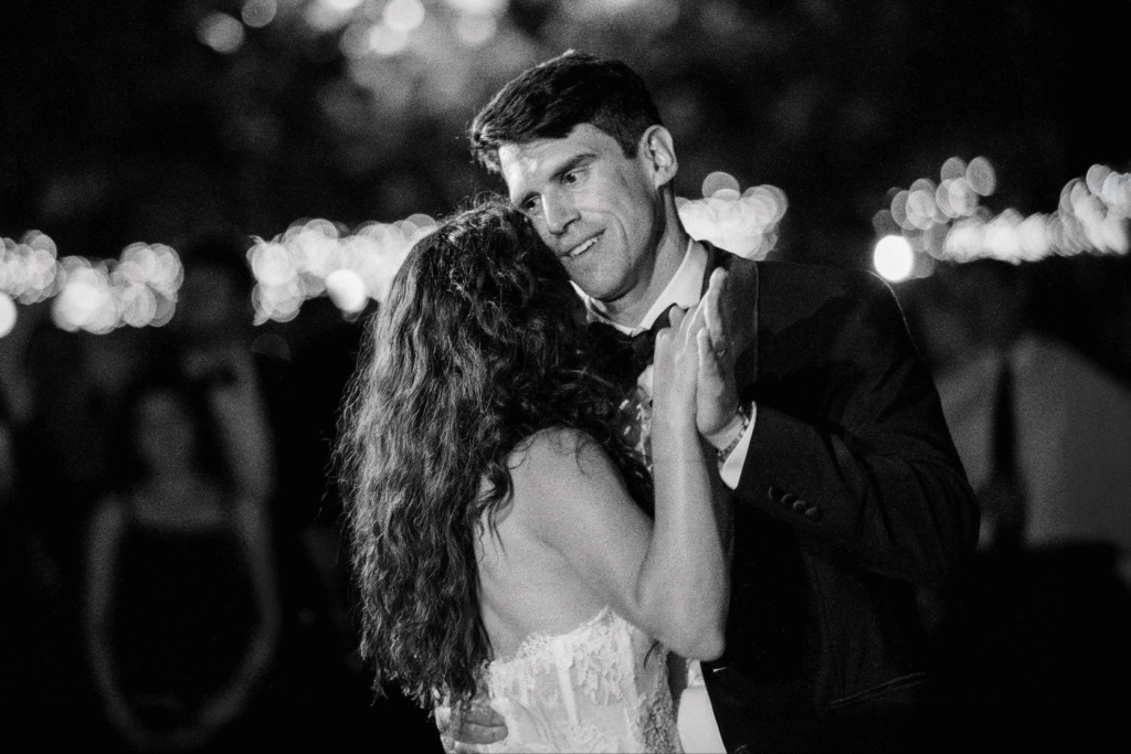 A couple enjoys a romantic first dance together