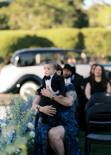 A person holding a child