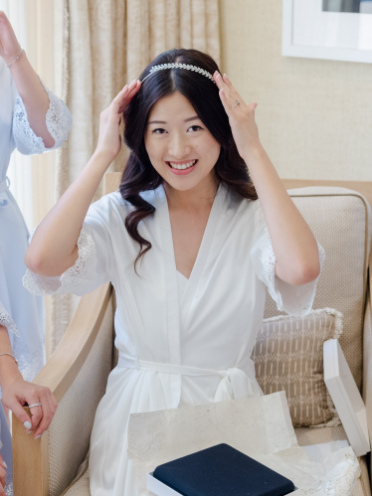 A bride finishing up her hair