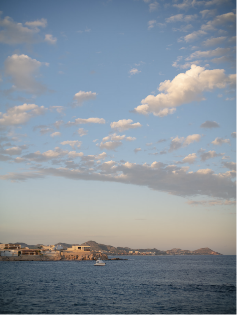 A distant view of a yacht on the water.
