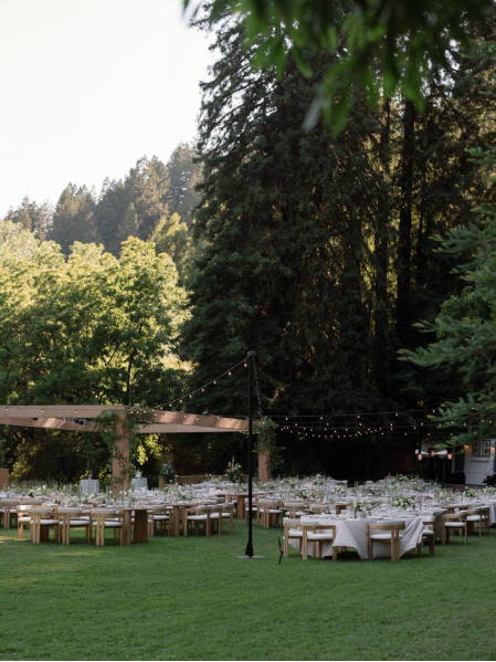 A beautiful wedding with outdoor lighting.