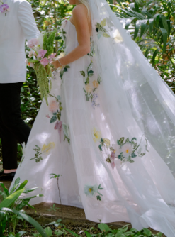 A bride wearing a non-traditional wedding dress.