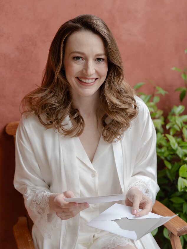 A bride is smiling