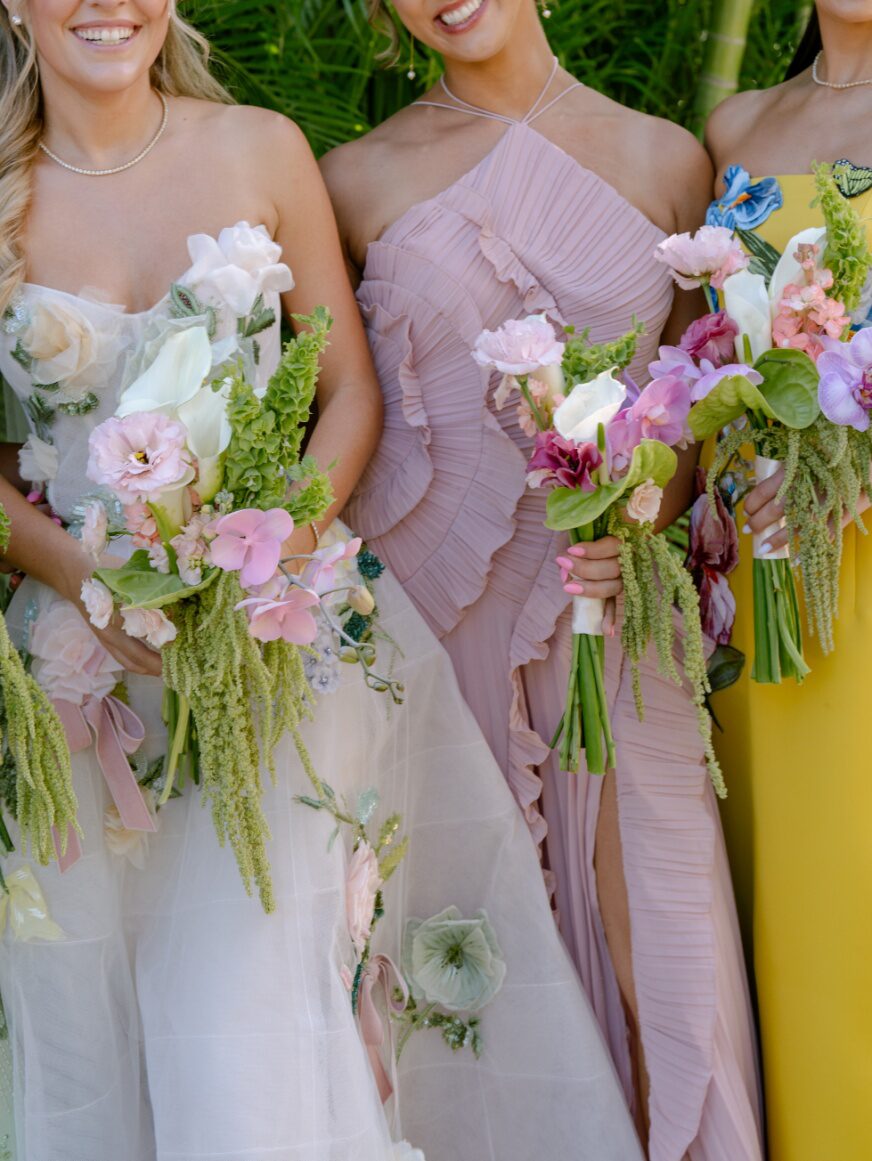 bridesmaids in colorful dresses.