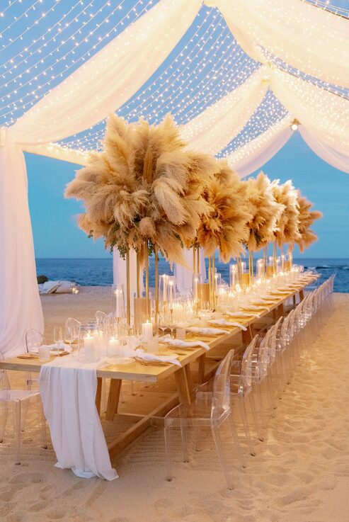 A reception table with fake trees
