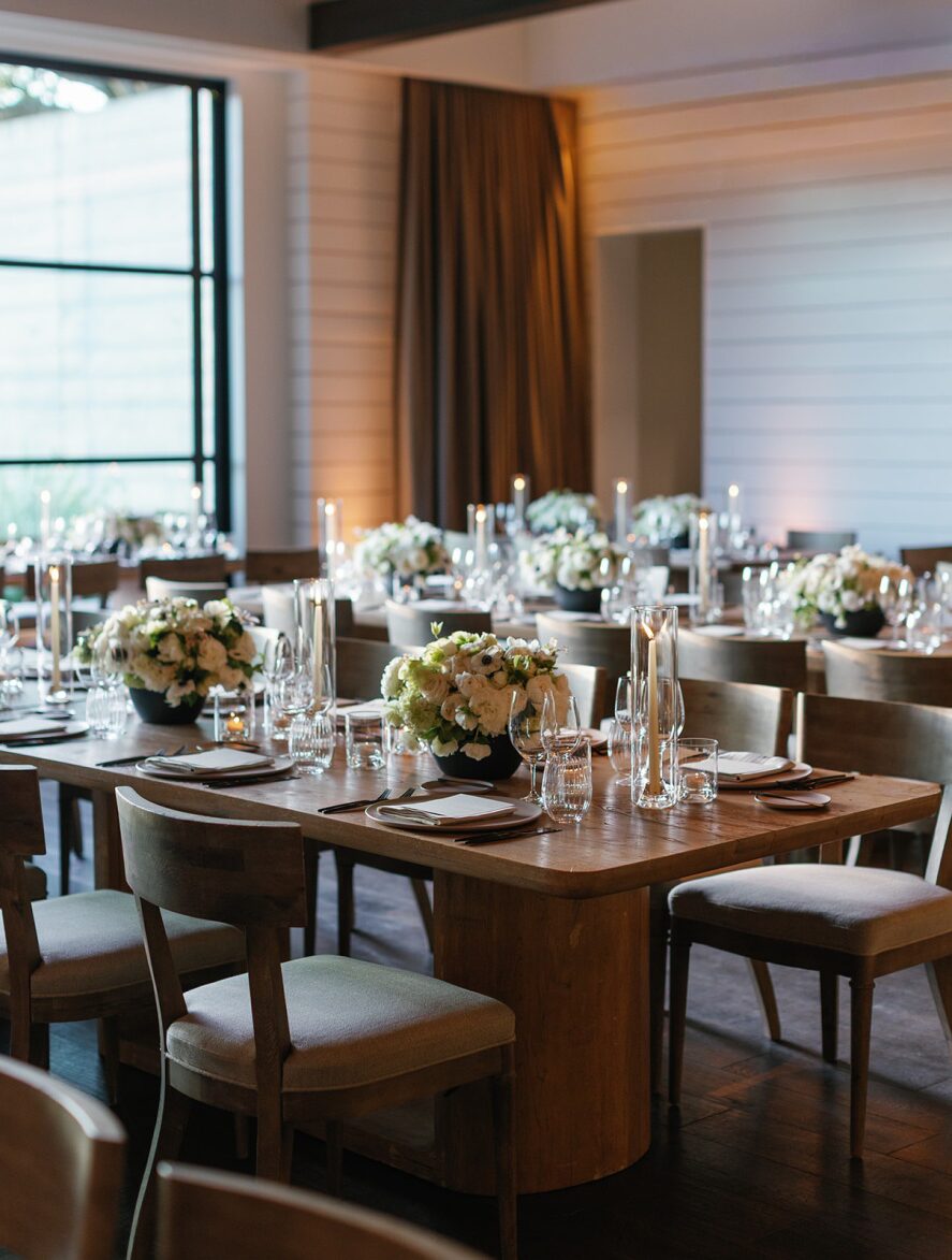 a wedding reception with wooden furnishings.