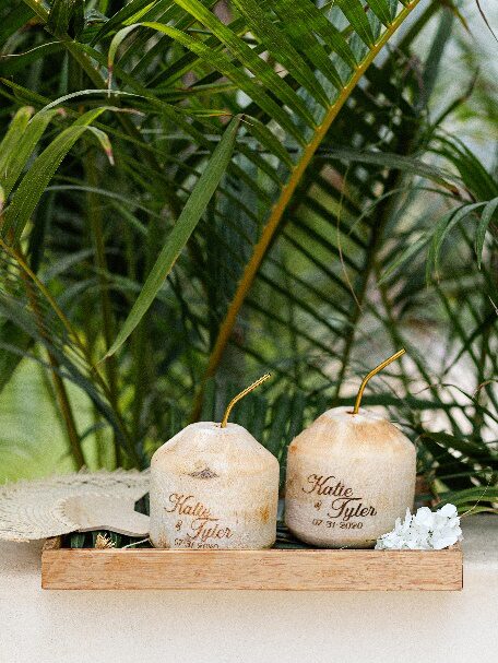 An image of coconuts on a wooden tray