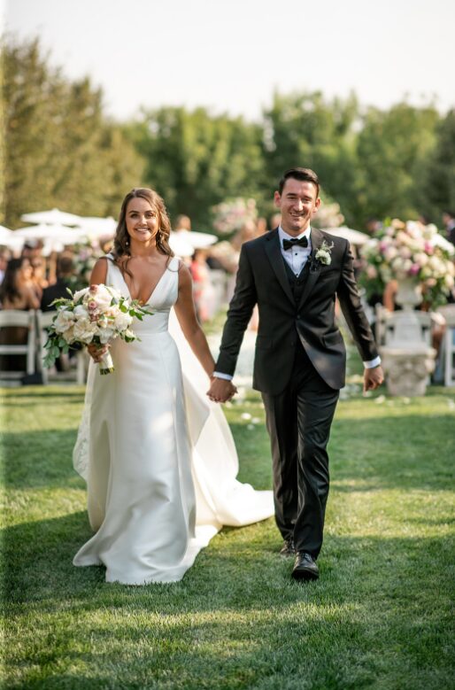 A couple walking down the aisle